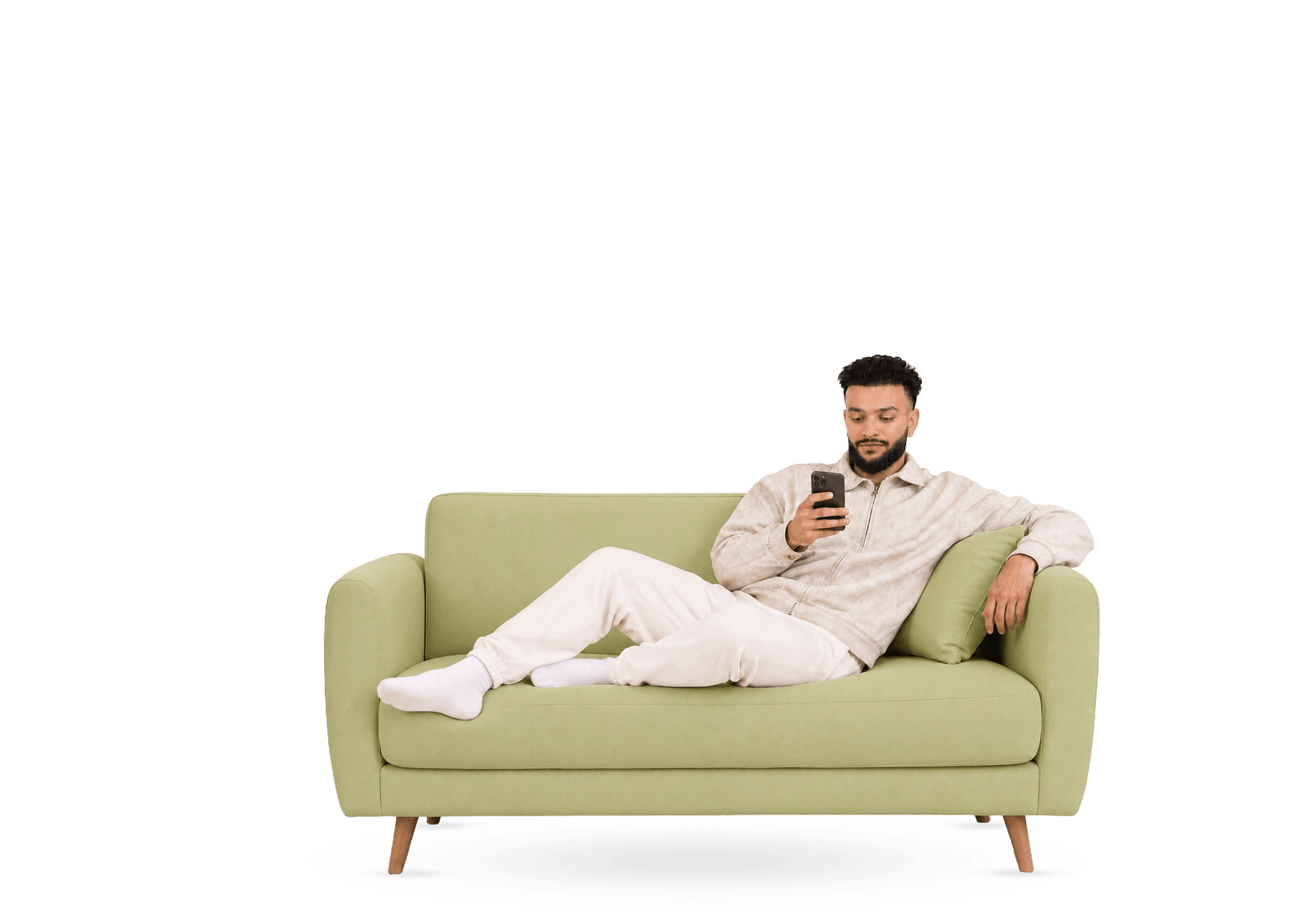 A man on a sofa watching a QHT Clinic doctor explain treatment on his phone